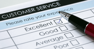 Tick placed in excellent checkbox on customer service satisfaction survey form.