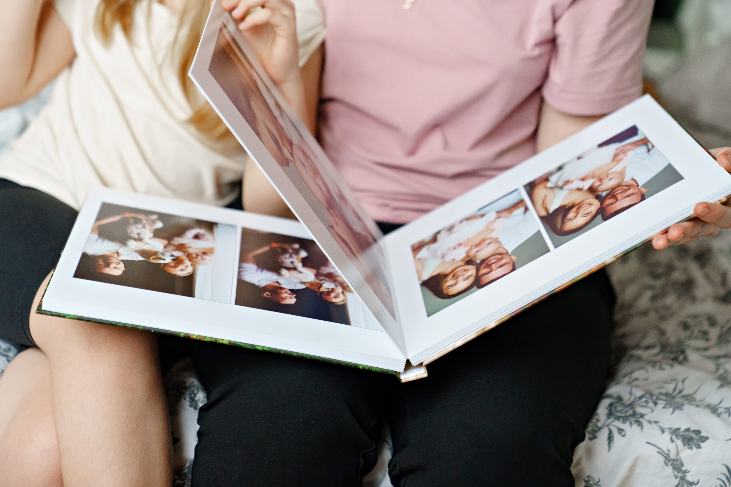 An image of people looking through a photo album.