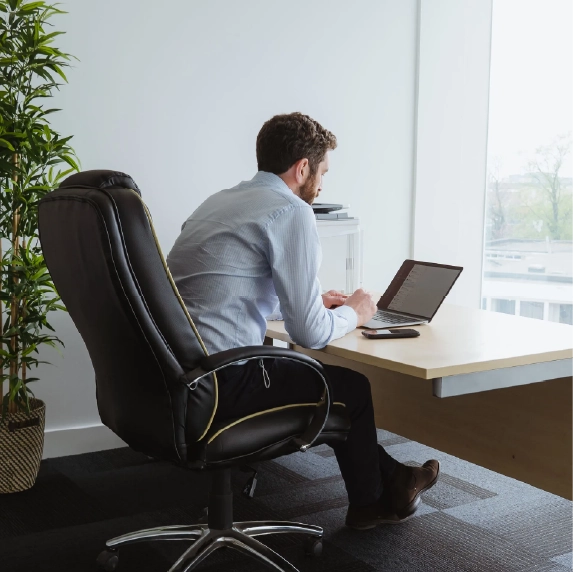 Man at his desk in an office space